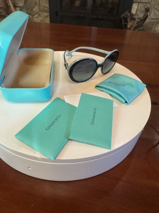 Tiffany & Co. Accessories - Tiffany & Co. Tiffany blue and black frame Sunglasses with Tiffany Blue lenses.